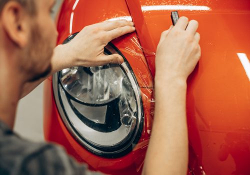 Car wrapping with foil at car service